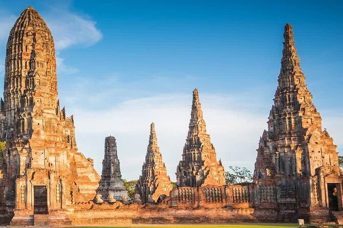 Afternoon Ayutthaya heritage site & River Boat Ride at Sunset - Wat Mahathat (15:15–15:45): The Buddha Head in Tree Roots