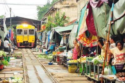Amphawa Floating Market Tour with Maeklong Railway Market (SHA Plus) - Maeklong Railway Market: watching the market make way for the train