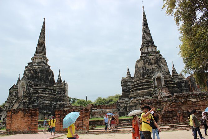 Ancient City Ayutthaya Private Guided Day Tour - Wat Mahathat and the Tree-Root Buddha: The Iconic Stop