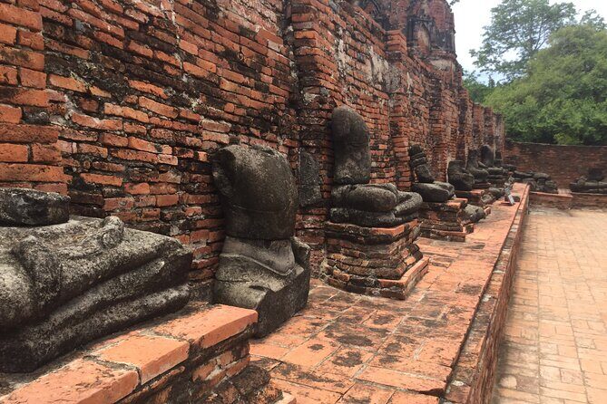 Ayuthaya Must Visit Temples Tour from Bangkok by MyProGuide - Wat Yai Chai Mongkol: the temple with stories that stick