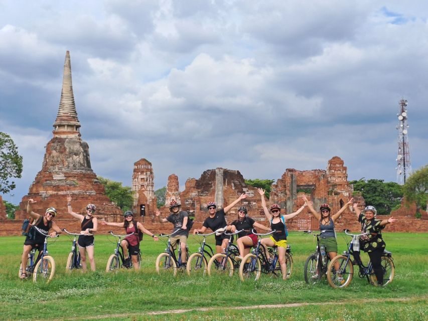 Ayutthaya City and Historical Park Bike Tour - Wat Mahathat: photos, Buddha roots, and the iconic moment