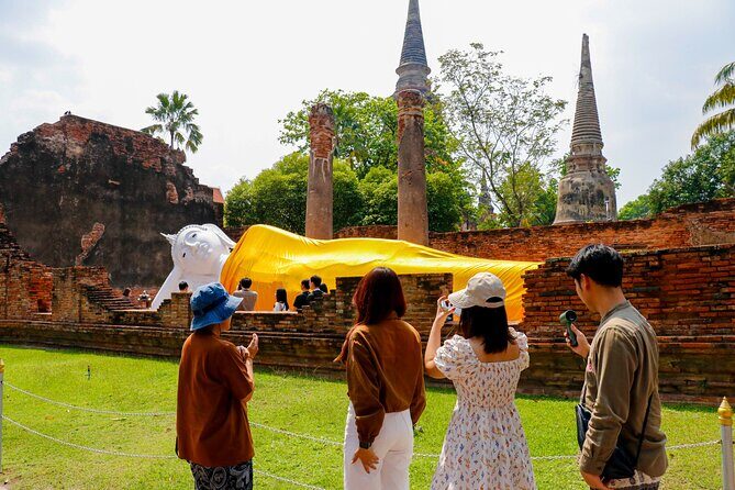 Ayutthaya Summer Palace and Temples Day Tour from Bangkok - Stop 3: Wat Mahathat and the Buddha Head in Tree Roots