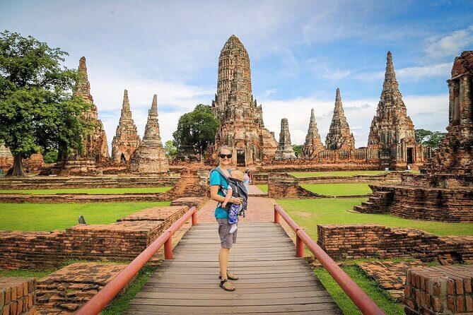Ayutthaya Sunset Tour: Iconic Temples & Scenic River Boat Ride - Wat Mahathat and the tree-root Buddha head moment