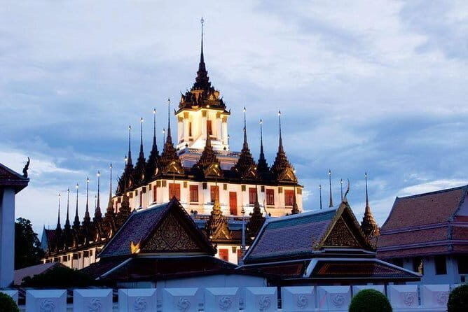 Bangkok Evening Food Tour by Tuktuk - Mahanak Market: classic market snacks and street-food textures