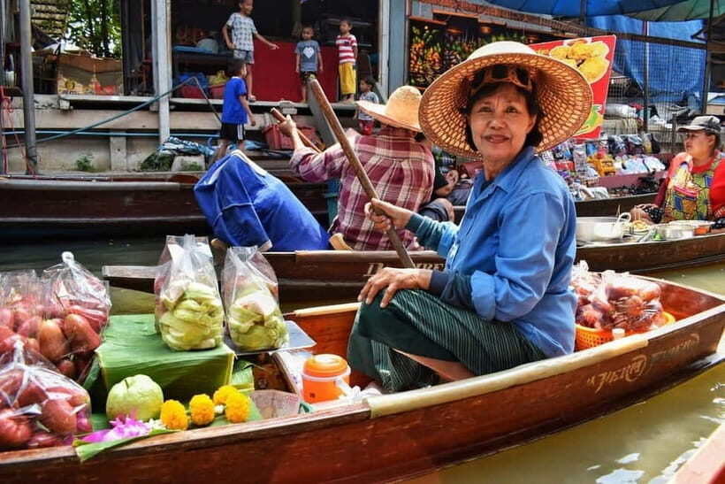 Bangkok: Famous Markets and Dragon Temple Guided Day Tour - Markets on a timetable: how the Maeklong Railway stop actually feels