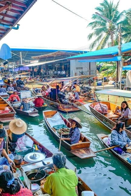 Bangkok: Famous Markets and Dragon Temple Guided Day Tour - Wat Samphran Dragon Temple: climbing the dragon for panoramic views