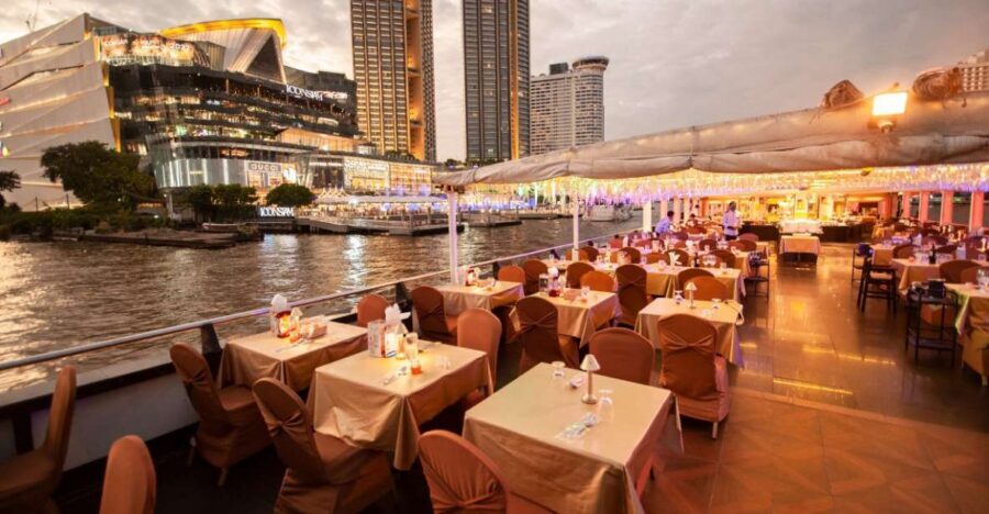 Bangkok: Grand Chao Phraya Dinner Cruise with Live Show - Getting on board: Asiatique warehouse no. 7 and the crowd reality