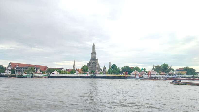 Bangkok: Longtail Boat Canal Tour to Wat Arun - The return cruise and Chao Phraya passing views