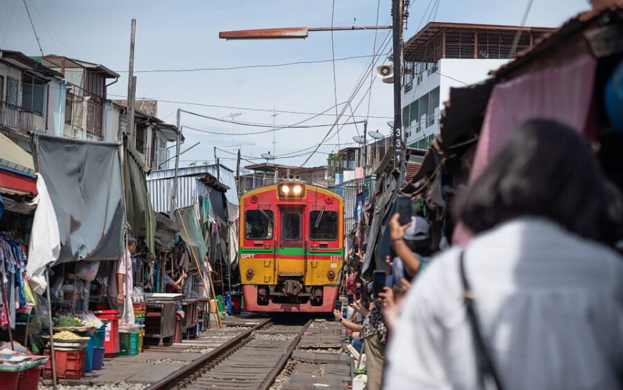 Bangkok: Maeklong Railway Market and Amphawa Floating Market - Maeklong Railway Market: Watching the Stalls Retreat for the Train