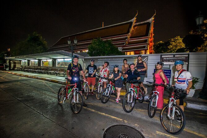 Bangkok: Night Bike Tour with Temples & Flower Market Visit - Rama VIII Bridge and the Photo Stop That Changes the Mood