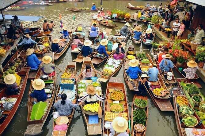 Bangkok: Railway and Floating Market Tour + Dragon Temple - Damnoen Saduak by longtail boat: snacks and shopping on the canal