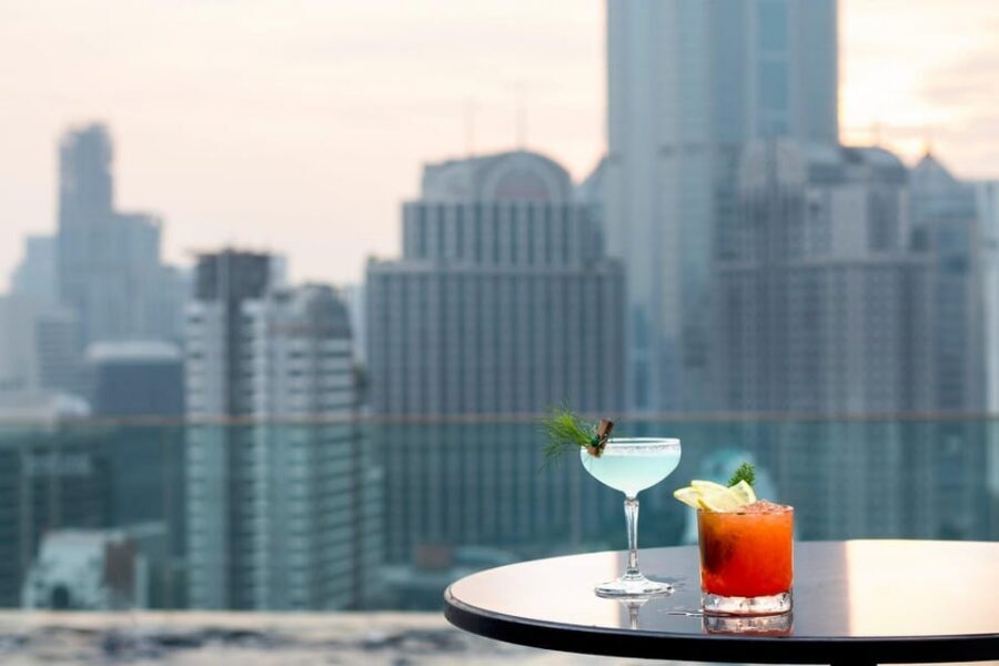 Bangkok: RedSquare Rooftop Bar at Novotel Sukhumvit 4 - Views you can photograph: skyline angles and the pool-in-front comfort