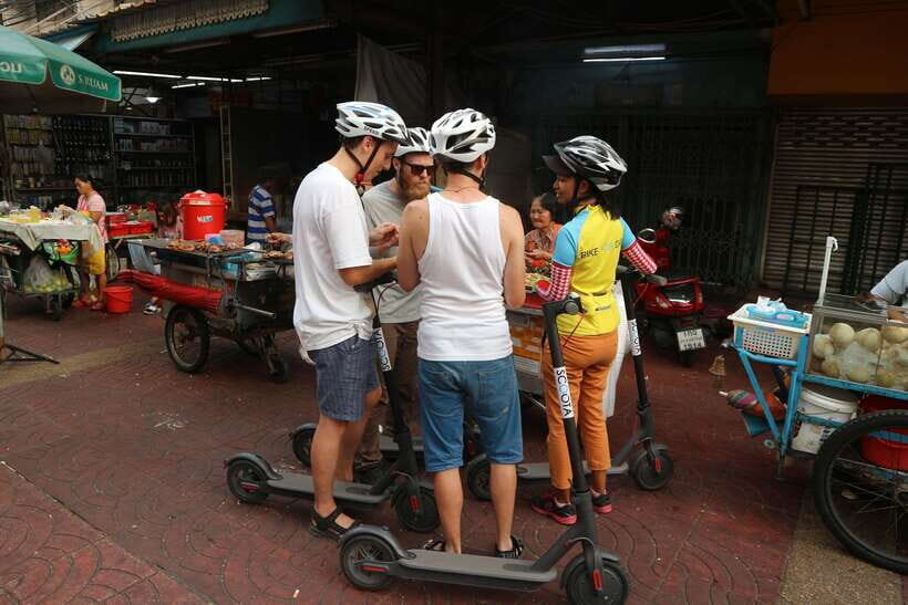 Bangkok: Riverside E-Scooter Adventure with StreetFood Snack - Turtle Feeding at Wat Prayurawongsawat Worawihan: A Warm-Weather Pause