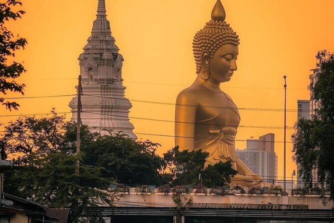 Bangkok : Sunset Food tour by Tuk Tuk boat with big Buddha view - The sunset cruiser: Wat Arun and Wat Pho from the riverside