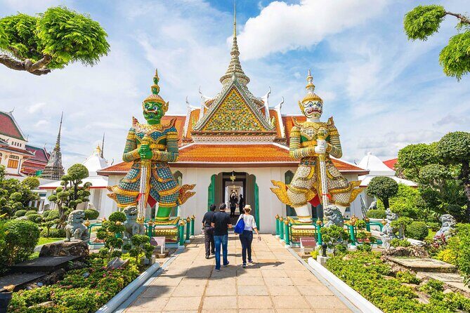 Bangkok Temples Tour at Wat Arun, Wat Phoa and Wat Saket - Wat Arun Temple of Dawn: A Riverboat Ride and Those Spires