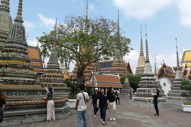Bangkok Tour: Highlights & Hidden Gems & Long Tail Boat - Chao Phraya River Long-Tail Boat: River Life, Temple Stops, and Fish Feeding