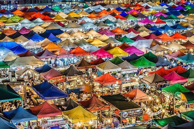 Bangkok Under the Night Lights by TUK-TUK (SHA Plus) - Wat Pho at night: quiet courtyards, but the reclining Buddha is closed
