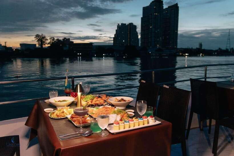 Bangkok: Unicorn Chao Phraya River Dinner Cruise - Inside the Unicorn cruise: open viewing spaces plus real sound