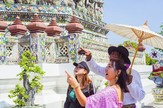 Bangkok Wat Pho and Flower Market Historical Walking Tour - Wat Pho Thong and the Reclining Buddha stop with a cooling break