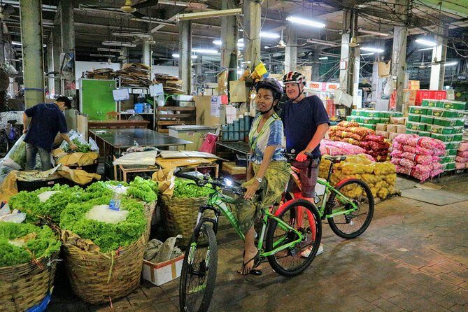 Bike Bangkok at Night with Thai Dinner - Chinatown by bike: neon alleys and street-food atmosphere