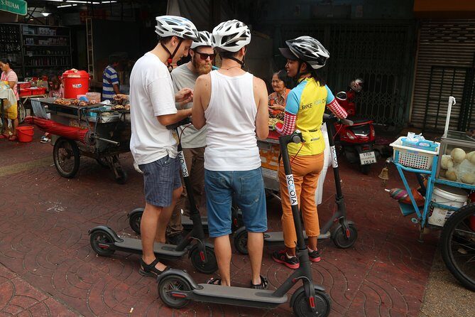 Explore Bangkok by E-Scooter & Try Street Food - Tha Din Daeng Market: pork satay with peanut sauce, plus local-market energy