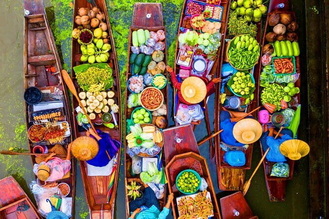 Floating and Railway Markets Private Tour - Stop 3: Mae Klong Railway Market, Hoop Rom-style, where the train runs the show