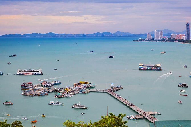 Floating Market & Pattaya City Landmarks Tour (SHA Plus) - Pattaya Floating Market: souvenirs, snacks, and deciding on the boat ride