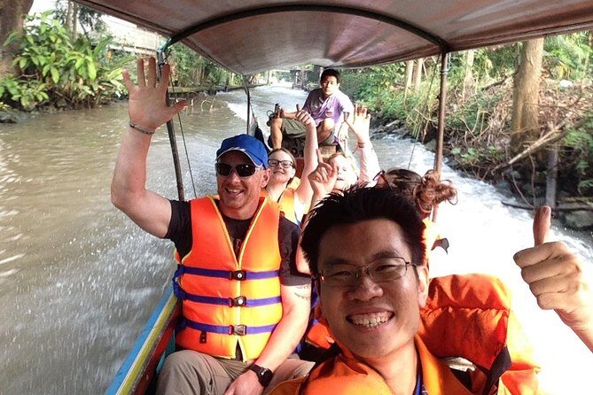 Floating & Railway Market and Coconut Farm Tour [Optional Luxury] - Mae Klong railway market (Hoop Rom Market): the train-through moment