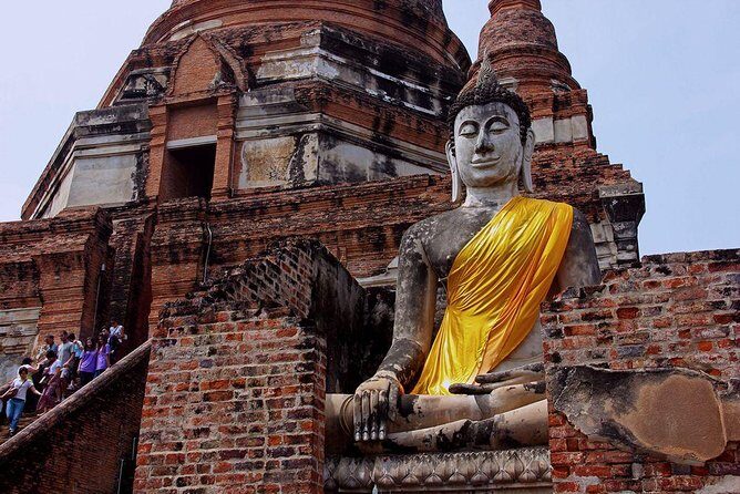 From Bangkok: Ayutthaya Temples Small Group Tour with Lunch - Stop 3: Wat Yai Chaya Mongkol and the story behind the chedi