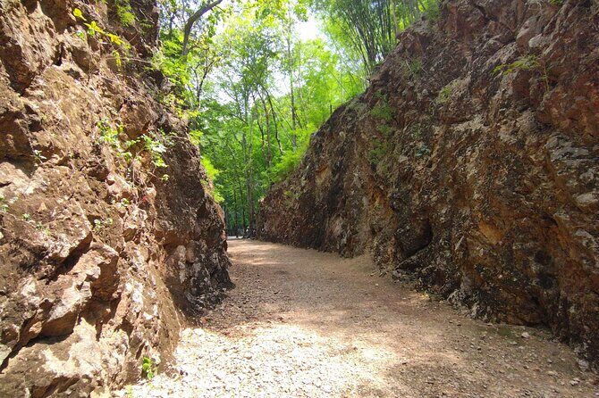 From Bangkok: Death Railway & Hellfire Pass Tour with Lunch - Why Hellfire Pass feels different from the River Kwai Bridge