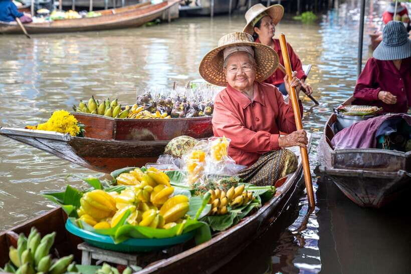 From Bangkok: Railway & Damnoen Saduak Floating Market Tour - Mae Klong Railway Market: Talad Rom Hup in real time