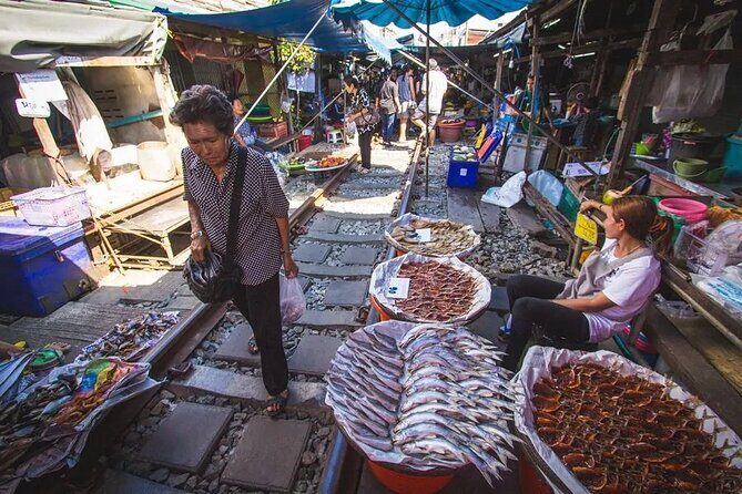 Maeklong Railway Market and Damnoen Saduak Floating Market Tour From Bangkok - Damnoen Saduak Floating Market: canal life from a long-tail boat