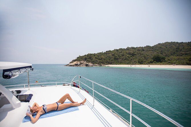 Pattaya Full-Day 3 Tropical Island tour Snorkeling Cruise Buffet - Serenity Yachting setup: lunch, drinks, and onboard comforts