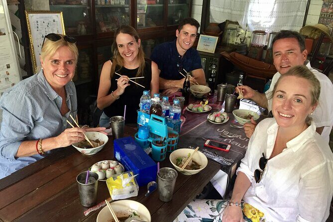 Private Excursion to Ayutthaya, UNESCO World Heritage site with Boat Tour - Wiharn Phra Mongkhon Bophit: short stop, big centerpiece (but entrance isn’t included)
