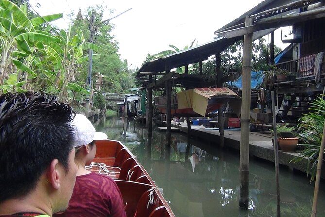 PRIVATE Floating Market + DRAGON Temple + DO like a Local - Mae Klong Railway Market: watching the market shift off the tracks