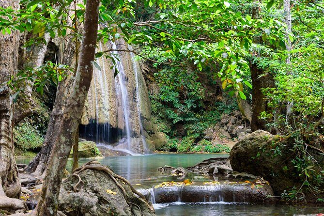 Private Tour : Erawan Waterfall and Bridge over the River Kwai - Stop 1: Kanchanaburi War Cemetery in a short, guided moment