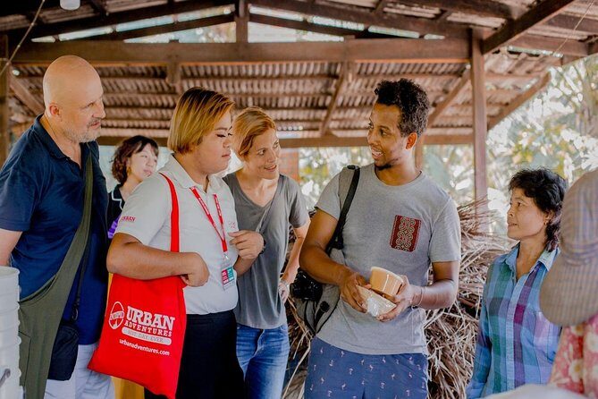 Private Tour from Bangkok: Railway and Floating Markets Tour - Damnoen Saduak Floating Market: shopping on both banks, plus snacks and fruit