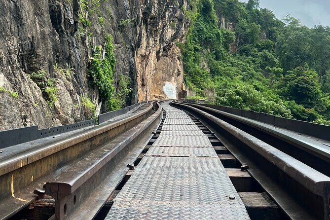River kwai & Kanchanaburi Day Tour From Bangkok - Krasae Cave and the Tham Kra Sae Bridge: The Death Railway Story, With Train Timing