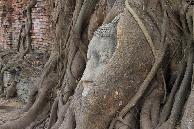 Small Group Tour to Ayutthaya Temples from Bangkok with Lunch - Stop 1: Wat Lokayasutharam and the reclining Buddha