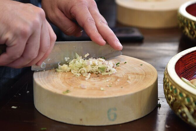 Thai Cooking Class with Market Tour in Sathon Bangkok - Cooking four Thai dishes and eating them hot