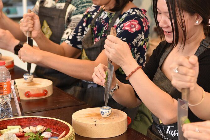 Thai Cooking Class with Market Tour in Sathon Bangkok - Small group cooking at a max of 18: better instruction, faster confidence