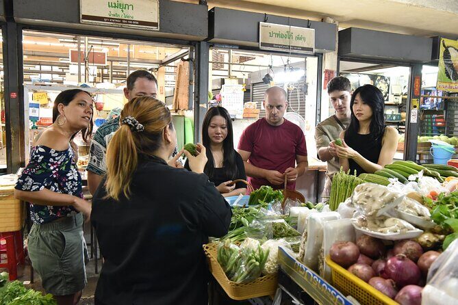 Thai Cooking Class with Market Tour in Sathon Bangkok - Suan Phlu Fresh Market: Picking ingredients for the 4 dishes