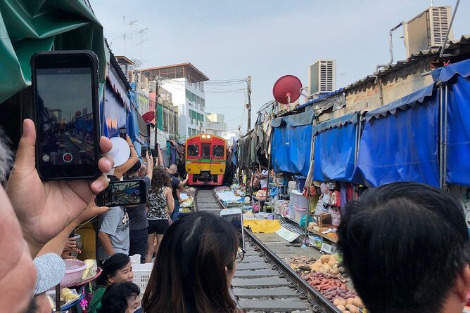 Train & Floating Market Food Adventure + Scenic train ride - Damnoen Saduak Floating Market: boat, snacks, and bartering practice
