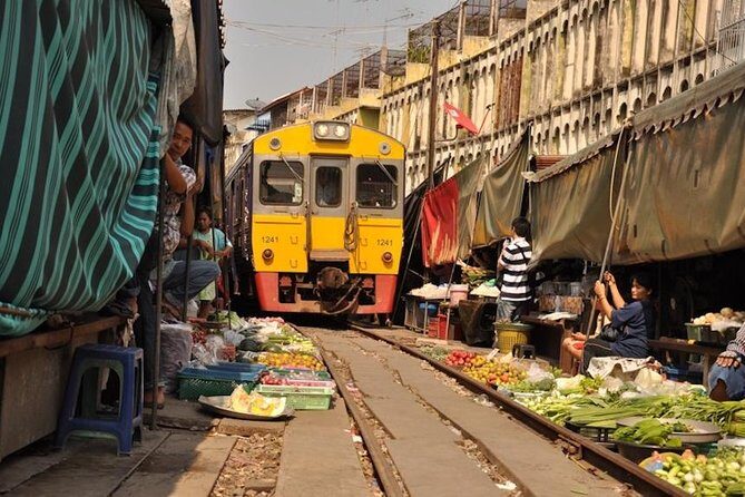 VIP Private Tour Damnoen Saduak+ Amphawa + Mae Klong Railway - Tree-in-the-Midst Temple: the visual moment you’ll remember